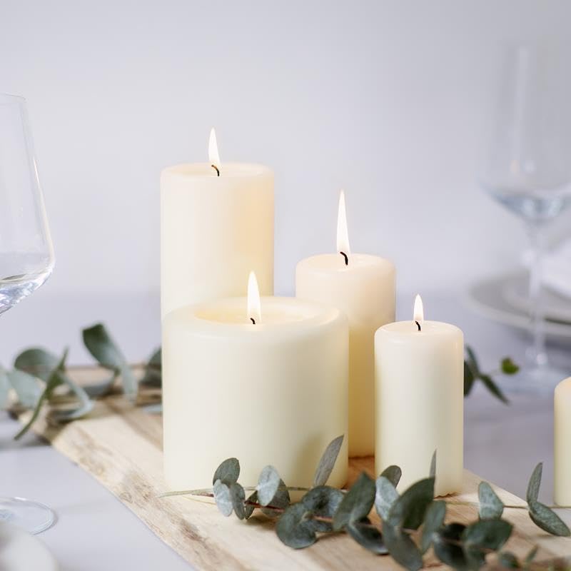 BOLSIUS Set of 12 Ivory Pillar Candles  - Like New