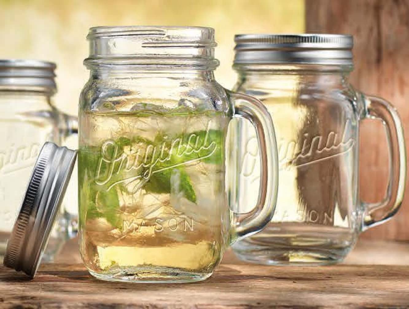 Mason Jar 16 Oz. Glass Mugs with Handle and Lid Set Of 4 - Home Essentials & Beyond - Old Fashioned Drinking Glass Bottles Original Mason Jar Pint Sized Cup Set.  - Acceptable