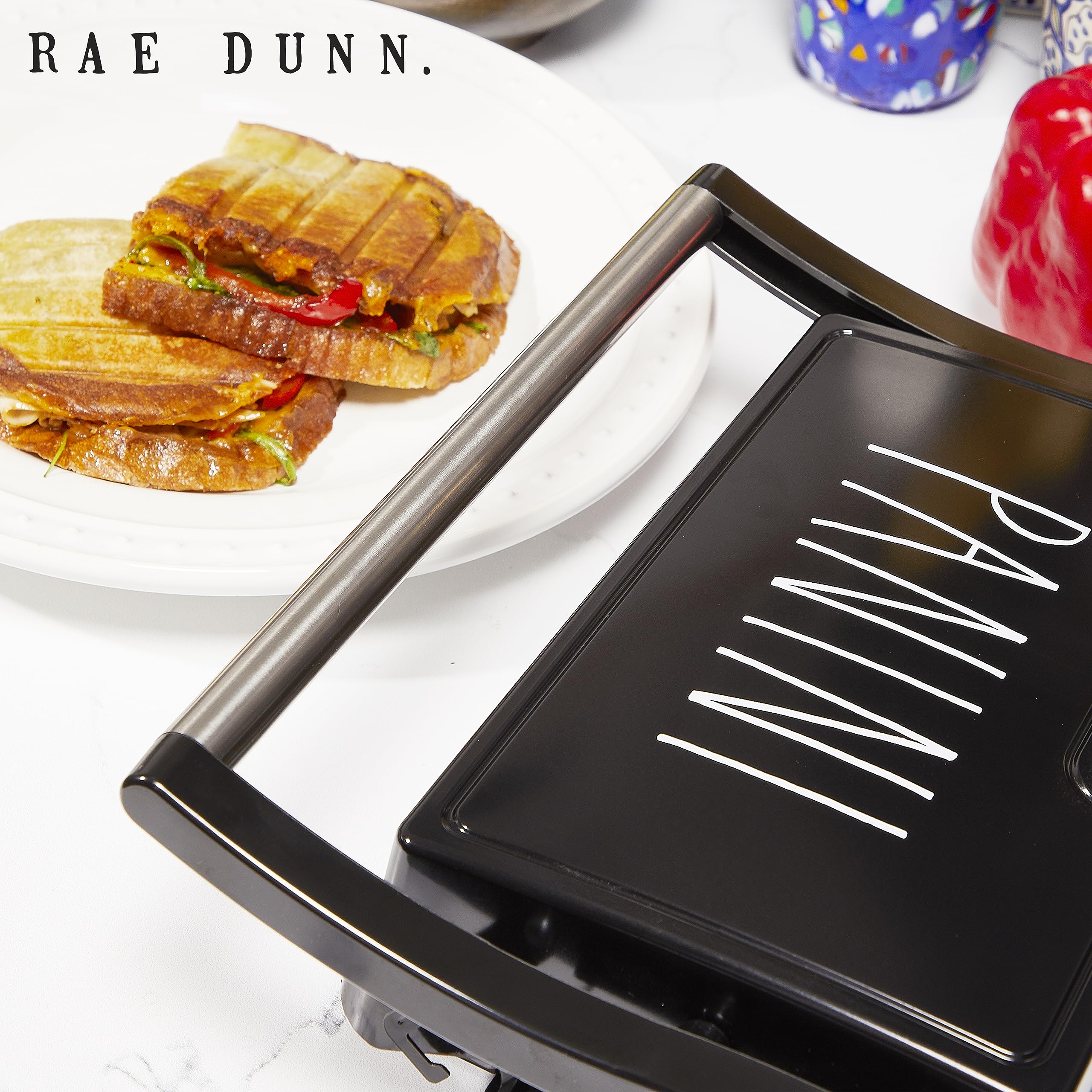 Rae Dunn Panini Maker - 750 Watt 2-Slice Press Grill with Indicator Lights | Opens 180 Degrees | Double Sided Heating | Non-stick Cooking | Cool Touch Handle | Easy to Clean, Black  - Very Good